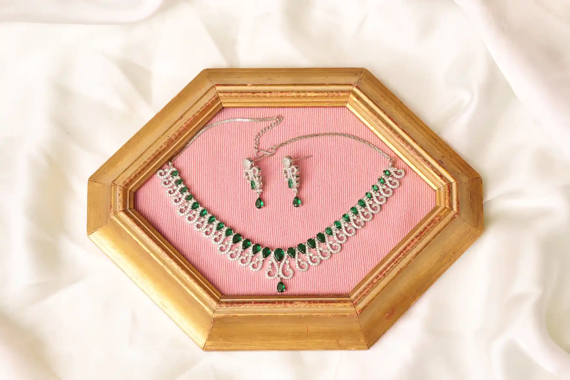 Emerald Drop Earrings and Scroll Chain Detail from Elara Green Necklace Set by Naila J Designs