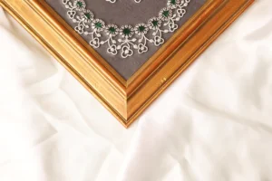 Close-up of Cora Green Floral Necklace Showing Clover Link Design and Emerald-Tone CZ Stones