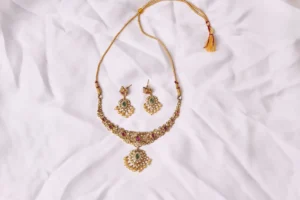 Jahan Ara Gold Necklace and Earrings Set with Adjustable Thread and Tassel Closure by Naila J Designs