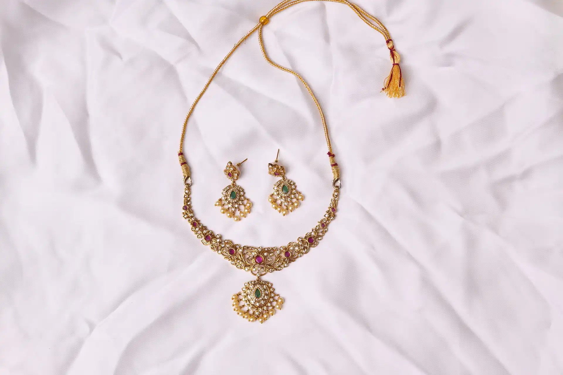 Jahan Ara Gold Necklace and Earrings Set with Adjustable Thread and Tassel Closure by Naila J Designs