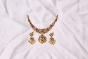 Jahan Ara Gold Polish Kundan Style Multi Stone Necklace & Earrings Set by by Naila J Designs