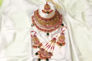 Kundan Bridal Set - Heer, Ruby-Red and Emerald-Green Detailing by Naila J Designs