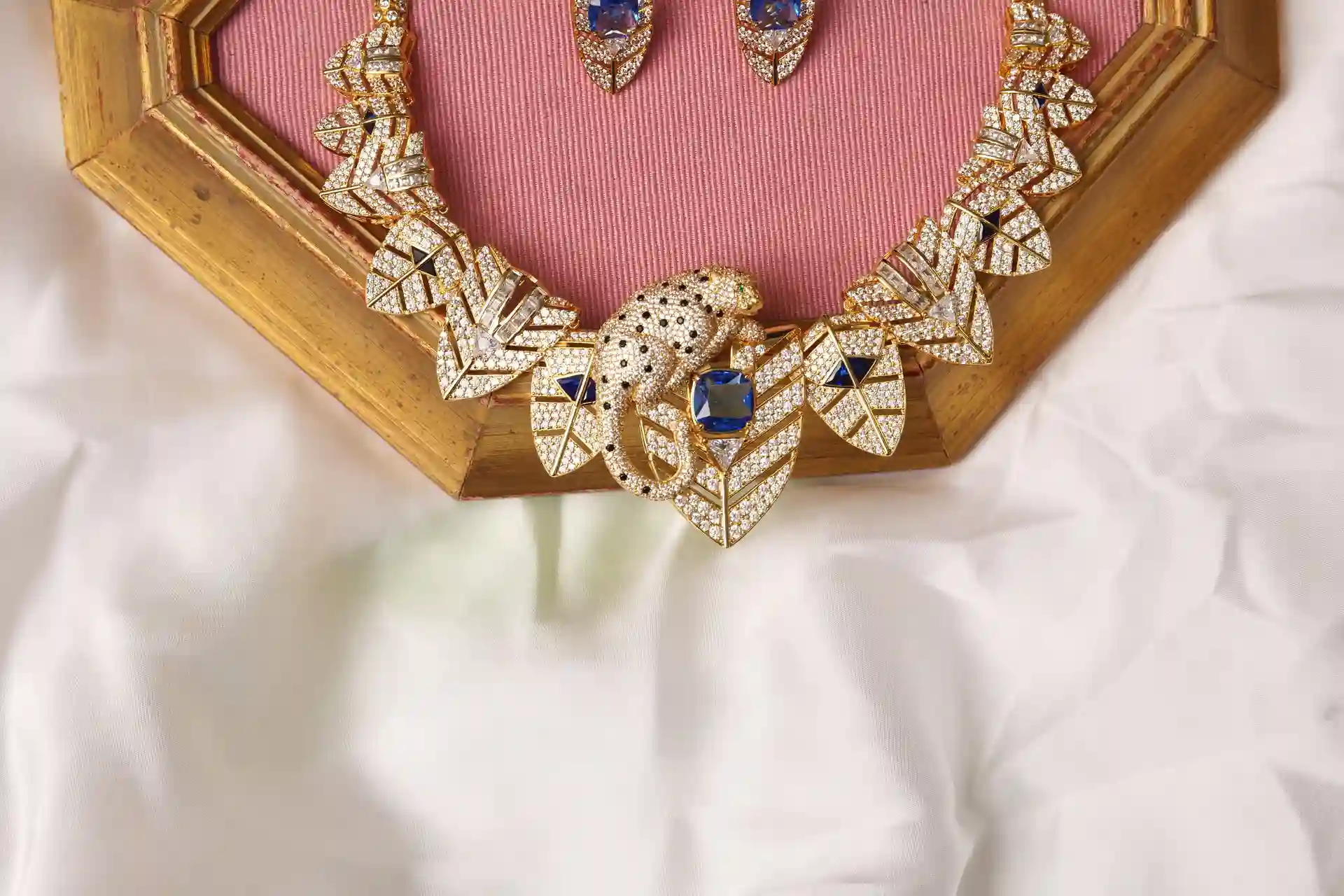 Close-up of Orra Necklace Sculptural Panther Figure with Blue Synthetic Sapphire and Pavé CZ