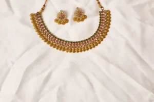 Close-up of Taj Noor Choker Scalloped Leaf Pattern with Ruby, Emerald, and Clear Stones