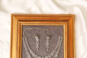 Close-up of Muse Mint Necklace Octagon Link Strand with Mint Green Stones in CZ Frame