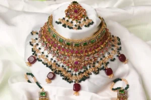 Raaj Rani Bridal Set Displayed on Mannequin - Choker Necklace, Tikka, and Bracelets by Naila J Designs