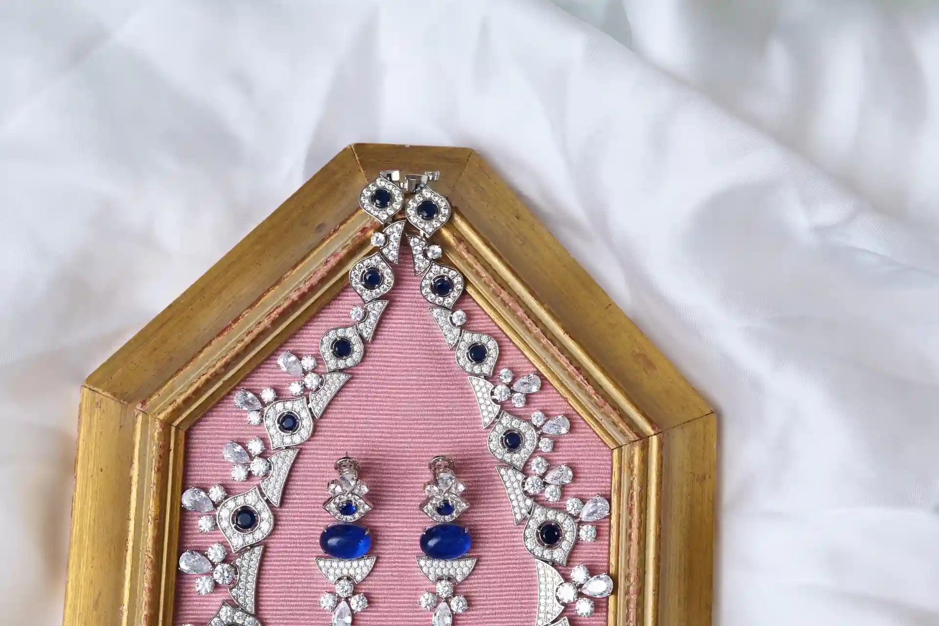 Close-up of Nava Sapphire Necklace Scalloped Fan Design with Sapphire-Blue Accent Stones