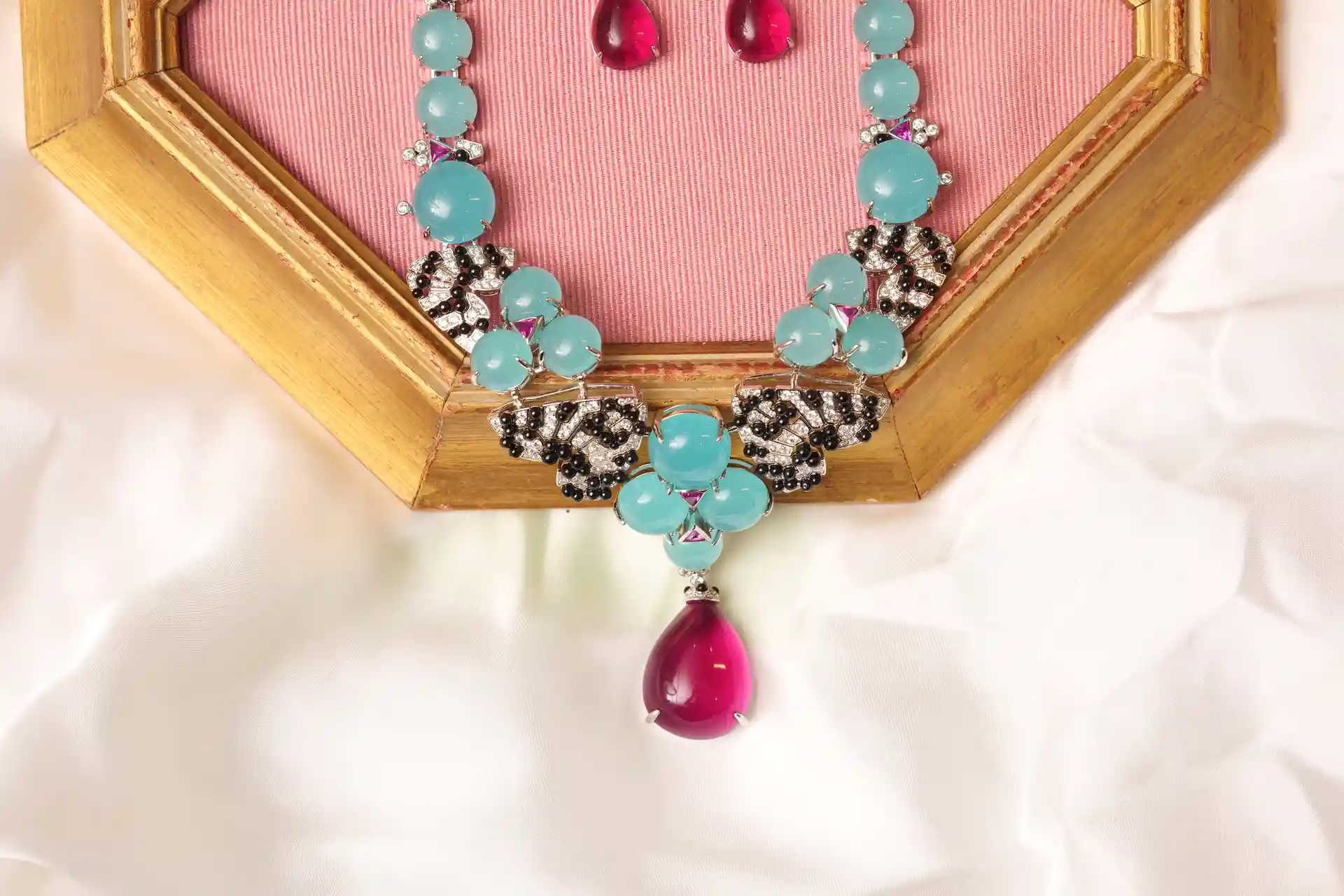 Close-up of Vela Necklace Pavé Fan Motif and Pink Tourmaline Teardrop Pendant